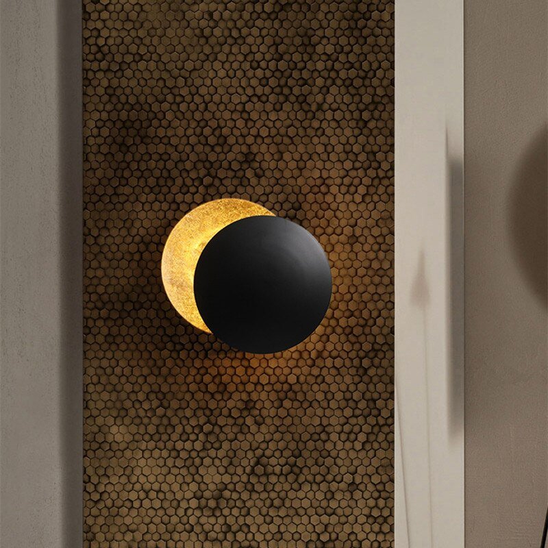 Aurelia – Gouden Wandlamp met Reflecterende Schijven