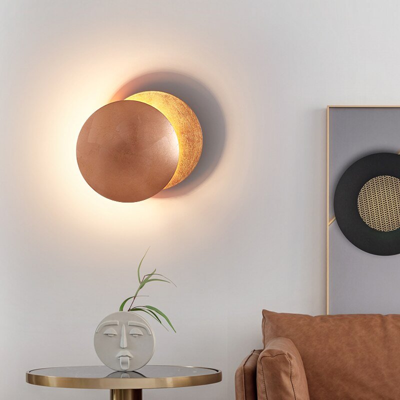 Aurelia – Gouden Wandlamp met Reflecterende Schijven