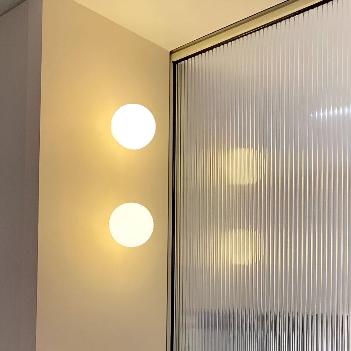 Dioscuri – Minimalistische Ronde Glas Wandlamp